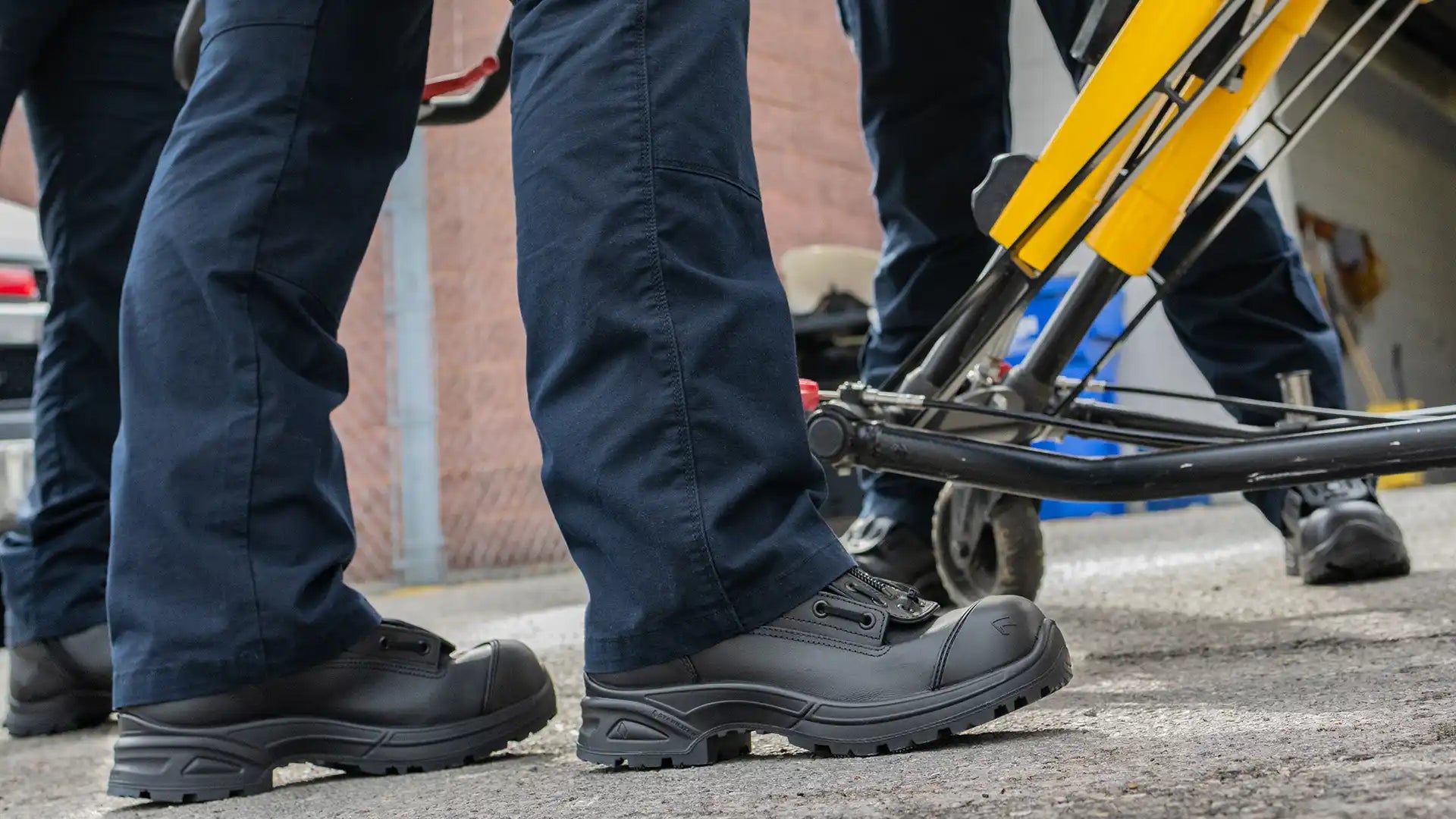 First responder in HAIX Airpower XR2 EMS boots next to stretcher