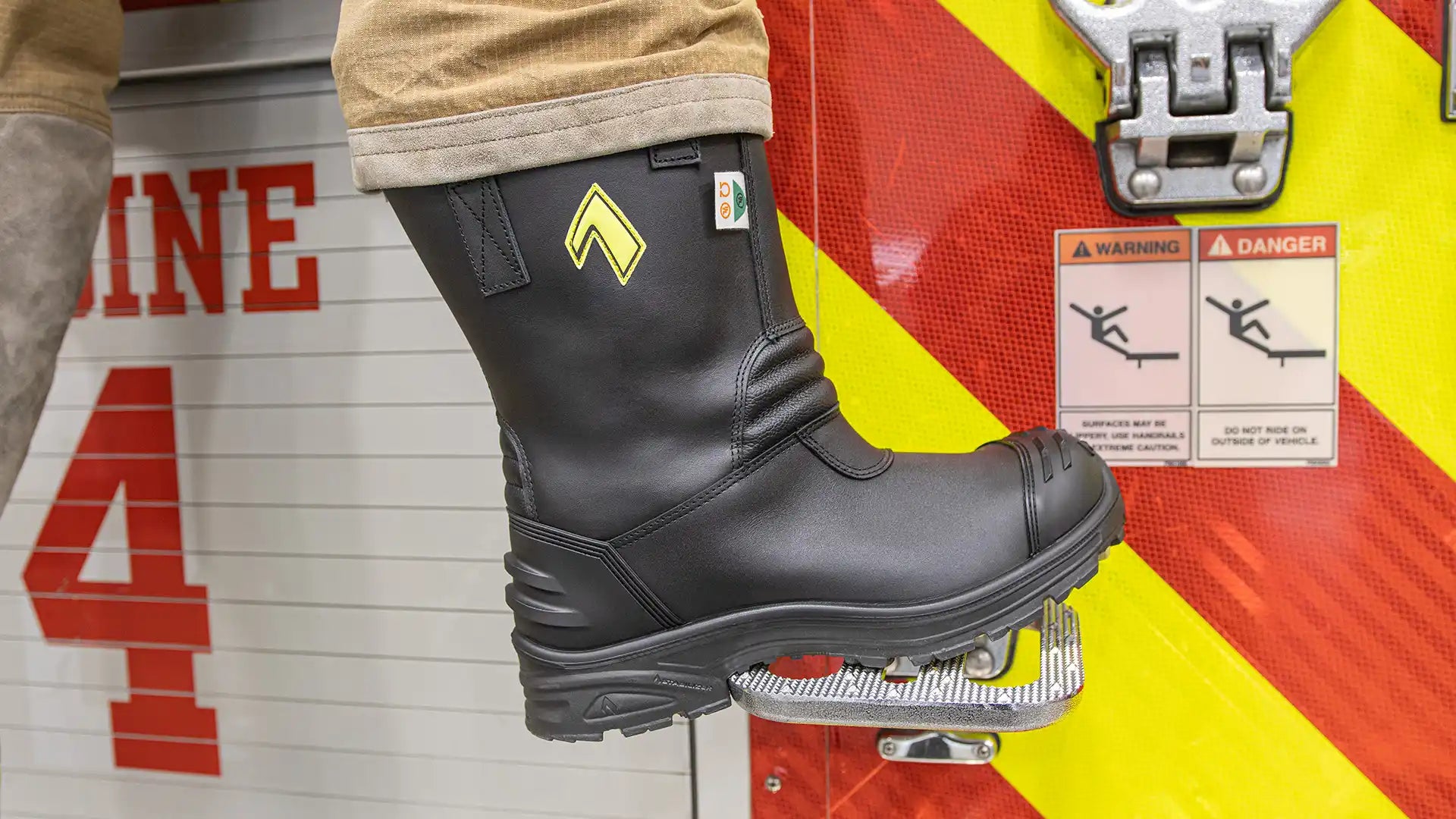 HAIX Fire Hunter Pro Women's firefighter boot climbing on fire truck