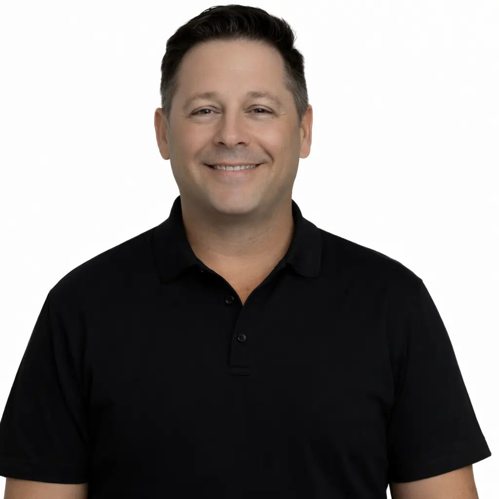 Bob Zoltewicz - Man wearing a black polo shirt against a white background